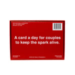 Red card game box with white text reading "A card a day for couples to keep the spark alive" and product details.