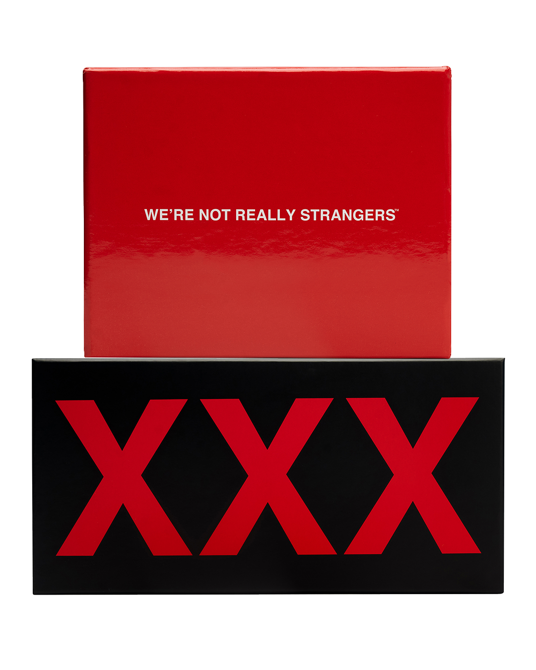 A glossy red box reading "We're Not Really Strangers" sits stacked on a wider black box with three large red X letters.