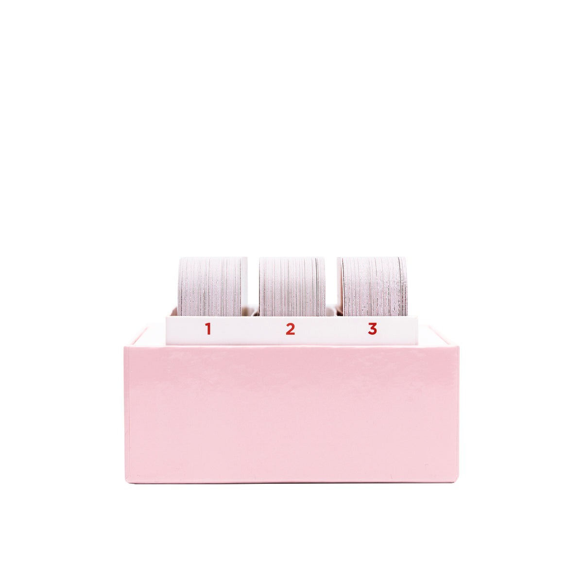 Pink tape dispenser with three rolls numbered 1, 2, and 3 in white and gray striped design.