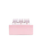 Pink tape dispenser with three rolls numbered 1, 2, and 3 in white and gray striped design.