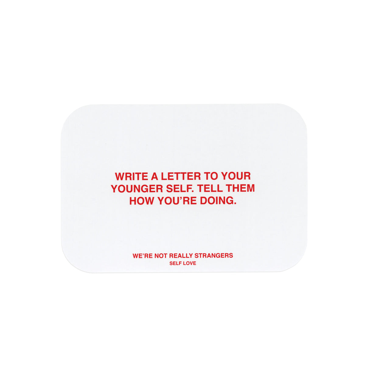 White card with red text reading "Write a letter to your younger self. Tell them how you're doing" and "We're not really stra