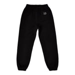 Black sweatpants with elasticized waistband and cuffs, featuring small Comfrt logo on back pocket.