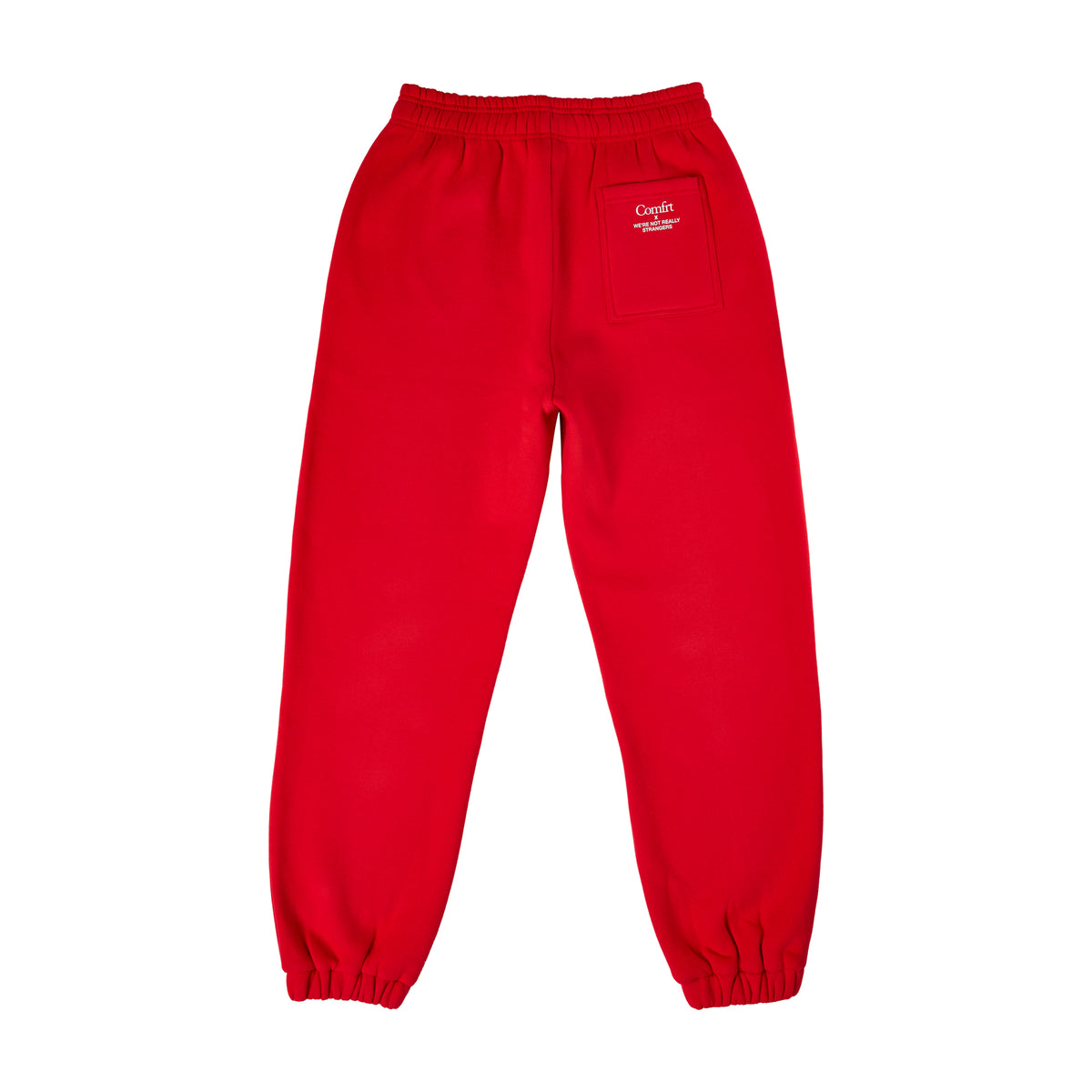 Red sweatpants with elastic waistband and cuffed ankles, featuring small Comfrt logo on back pocket.