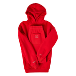 Red pullover hoodie and sweatpants set with kangaroo pocket and text branding on chest and sleeves.