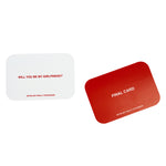 Two cards displayed: white card reading "Will You Be My Girlfriend? We're Not Really Strangers" and red card reading "Final C