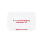 We're Not Really Strangers E-Gift Card. Front facing view of white card option reading "Thank you for existing and being you" in red font.