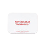 White rounded rectangle card with red text reading "In what ways are you most like the people who raised you?" and "We're not