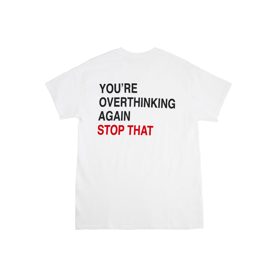 We're Not Really Strangers Mental Health Awareness Month. Back view of white You're Overthinking Again Tee with medium size font in black reading 