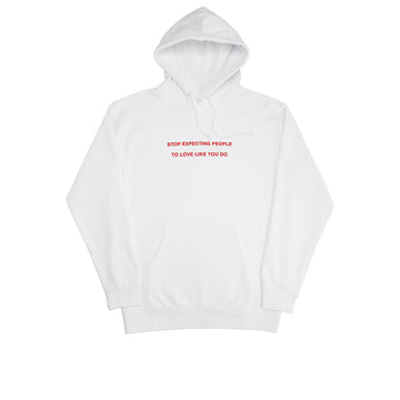 We're Not Really Strangers front zoomed out view of white hoodie reading 