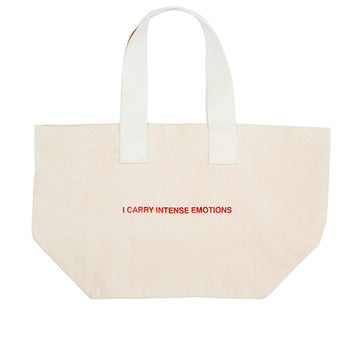 We're Not Really Strangers Tote Bag that reads 